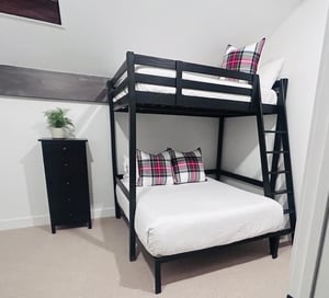 Snowcrest 317 vacation rental offers a queen over full bunk bed upstairs.