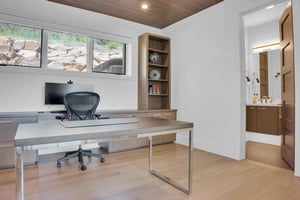 Vacation rental private office with two large work spaces.