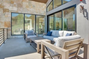 Vacation rental patio with nice patio furniture with seating for 5 guests.