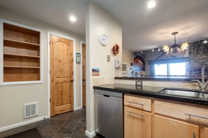 Kitchen overlooking dining and living area