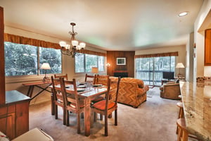 Seating for 6 at the dining room table plus additional bar seating at the kitchen breakfast bar