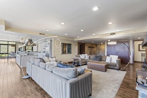 Lowell 401 has a spacious living area with two large sectional sofas and two leather ottomans.