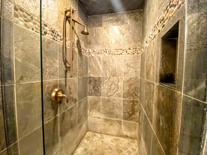 Slate tile walkin shower.