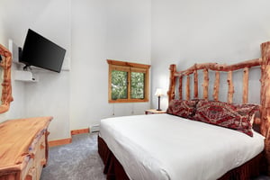 The main suite offers a king size bed and flat screen TV.