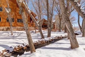 The Timber Wolf community has a lovely stream running through it and mature trees.