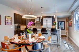 Stylish dining table seating 6 counter seating 4  ParkCityLodging_820ParkAve204_Dining_1