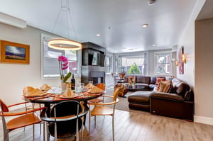 Graceful open floor plan dining table seating 6  ParkCityLodging_820ParkAve204_Dining_2