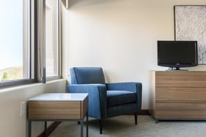 Main bedroom suite with resort plaza views