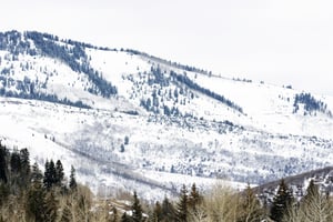 Gorgeous views of snowy surrounding mountains in the wintertime