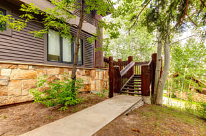 Aspen Hollow 6 has a private walkway and wooden stairway for the entryexit.
