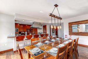 Lowell 402 dining table with seating for 10 guests.
