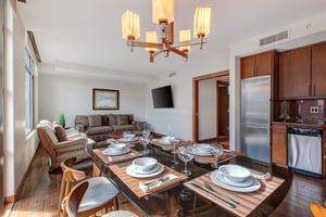 Lowell 402 dining area and open concept living room.