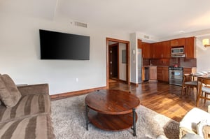Lowell 402s second living room with flat screen TV.