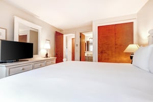 The main suite offers a king size bed and attached bathroom.