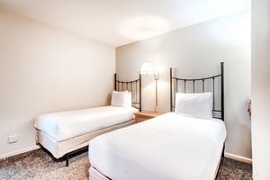 The second bedroom offers two twin size beds.