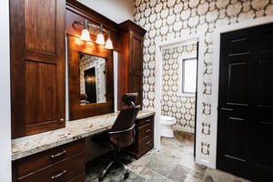 Ensuite private main bathroom with spacious vanity.