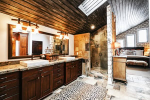 Ensuite private main bathroom with dual sinks.