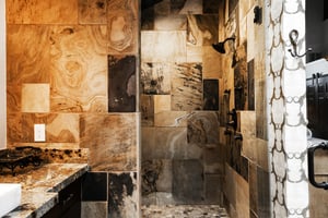 The ensuite private main bathroom offers a walkin tiled shower.