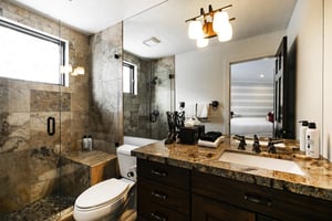 A bathroom with a walkin shower.