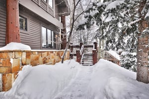 The exterior of Aspen Hollow 6 covered with snow.