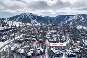The exterior of Aspen Hollow 6 with a skiout trail to Deer Valley Resort.