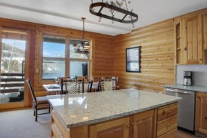 The open concept kitchen and dining area.