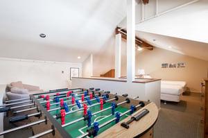 The loft offers a foosball table for kids and adults alike.