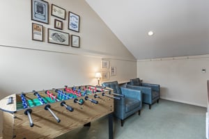 The loft offers a foosball table for kids and adults alike.