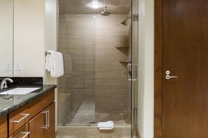 Main shower, convenient towel racks, rain shower head