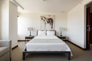 Guest bedroom with Queen bed and dual nightstands