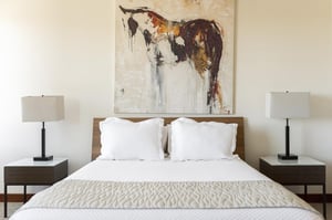 Guest bedroom, white duvet cover, white linens, and accent runner