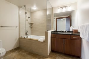 Full guest bathroom with step in tubshower combo
