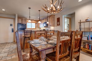 Snow Flower 20 has a wood dining table and 6 wood chairs.