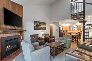 Snow Flower 79 has a living room with plentiful seating, flat screen TV and gas burning fireplace.