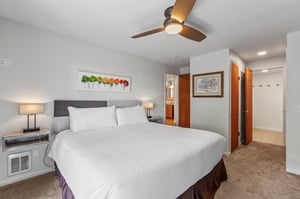 The main suite offers a kingsize bed and sliding glass doors and en suite bathroom