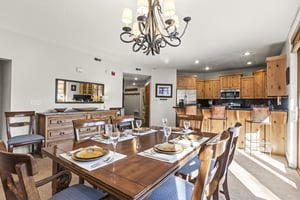 Town Pointe C101 has an open floor plan and a dining table with seating for 68 guests.