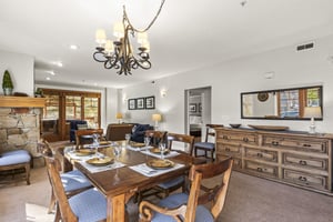 Town Pointe C101 has an open floor plan and a dining table with seating for 68 guests.