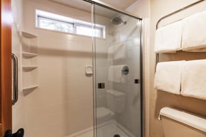 En suite main bathroom has a walkin shower