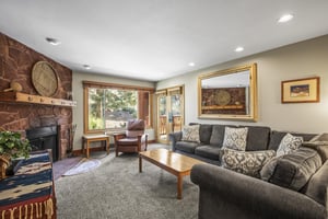 Snow Flower 007 offers a cozy living room with spacious seating and gas burning fireplace.