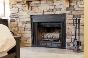Wood burning fireplace in the main bedroom