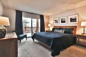 Main Bedroom features a luxurious kingsized bed