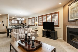Living area with gas fireplace and flat screen TV