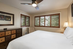 Main bedroom with views of the pine trees