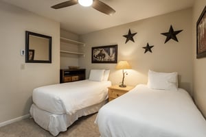 Guest bedroom with two twinsized beds