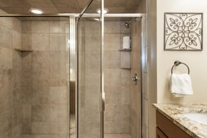 Guest bathroom features an updated walkin shower