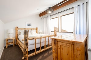 Queen bed in the loft