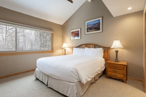Vaulted ceilings in the main bedroom