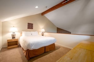 The open loft has additional sleeping on the comfortable queensized bed