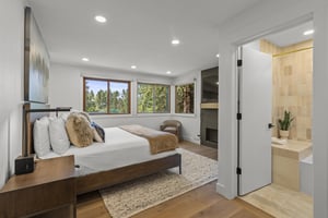 The main suite has a kingsize bed and gas burning fireplace and flat screen TV.