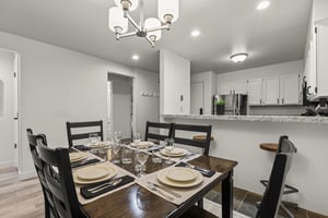 The dining table offers seating for 6 guests.